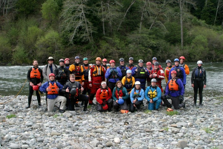 a group of people posing for the camera