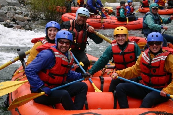 a small child sitting on a raft