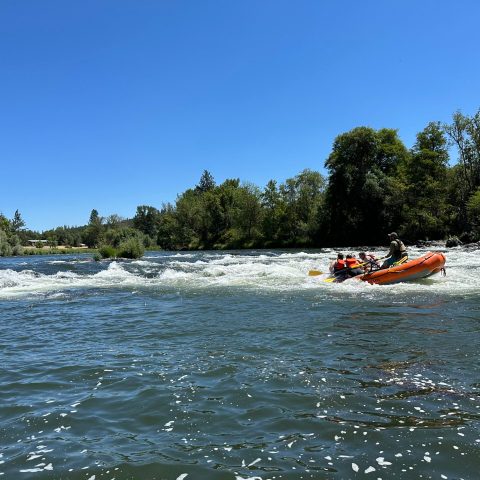 a small boat in a body of water