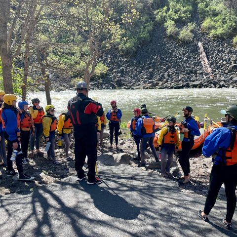 a group of people walking up a hill
