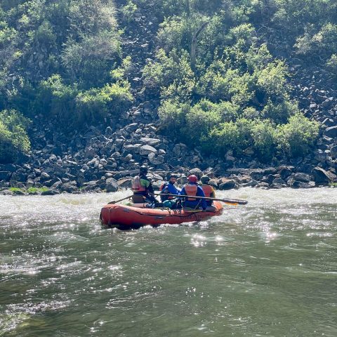 a small boat in a body of water