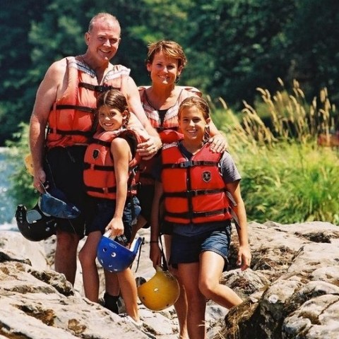 a person standing on a rock