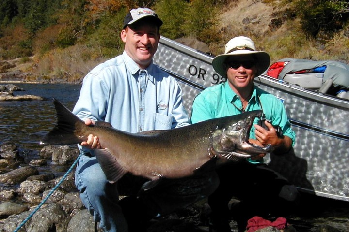 a person holding a fish